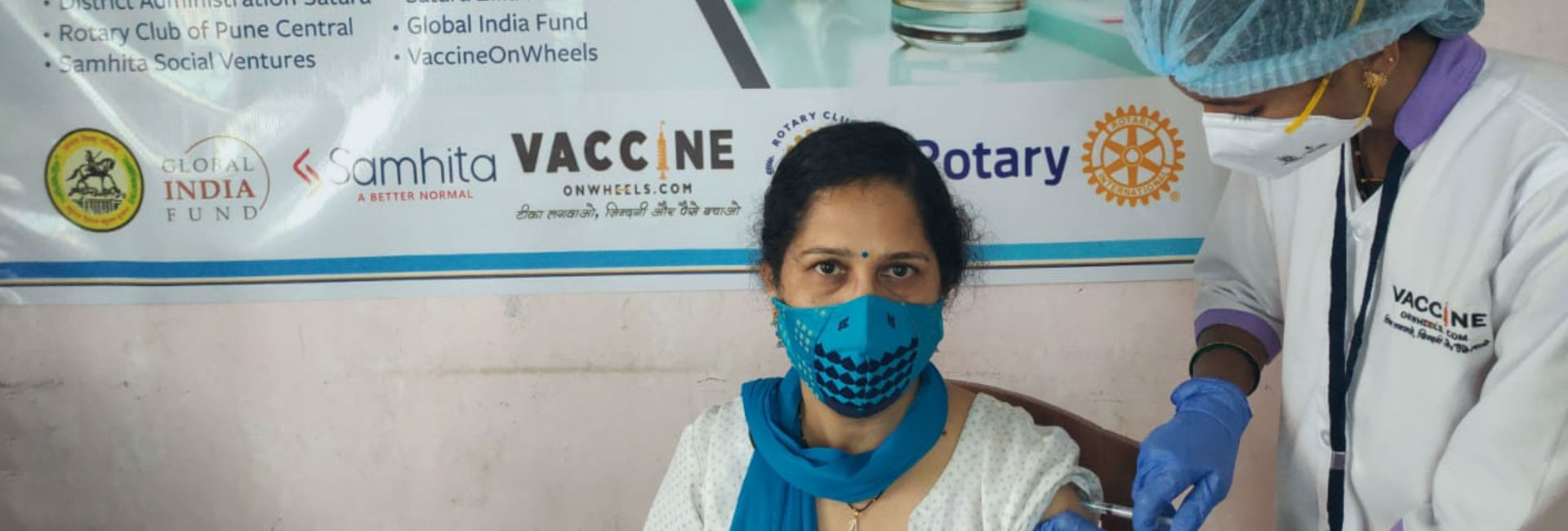 Woman receiving vaccination